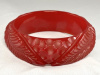 BB485 transparent red leaf carved bakelite bangle